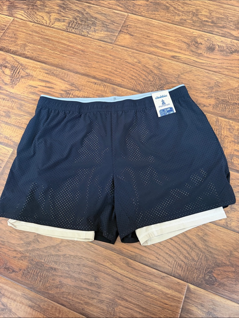 Chubbies Black athletic mesh over tan liner workout shorts
